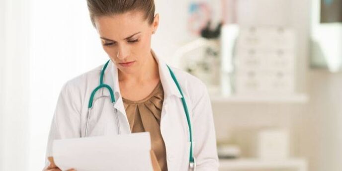 doctor examines tests for diagnosing papillomavirus